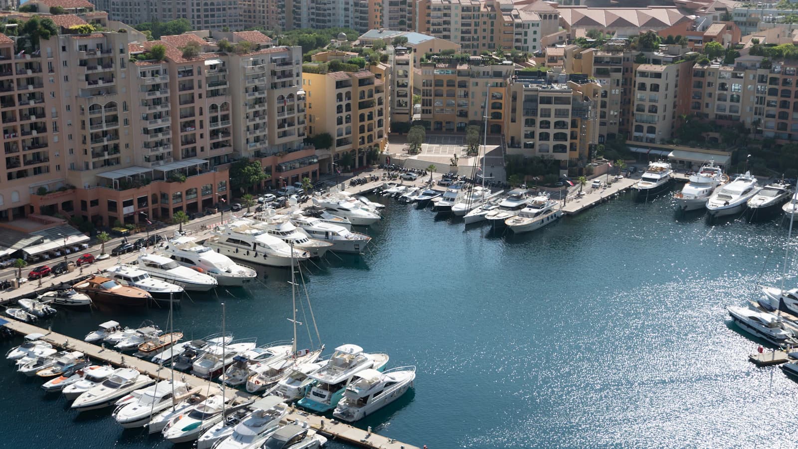 Luxury yachts packed into a Mediterranean harbour